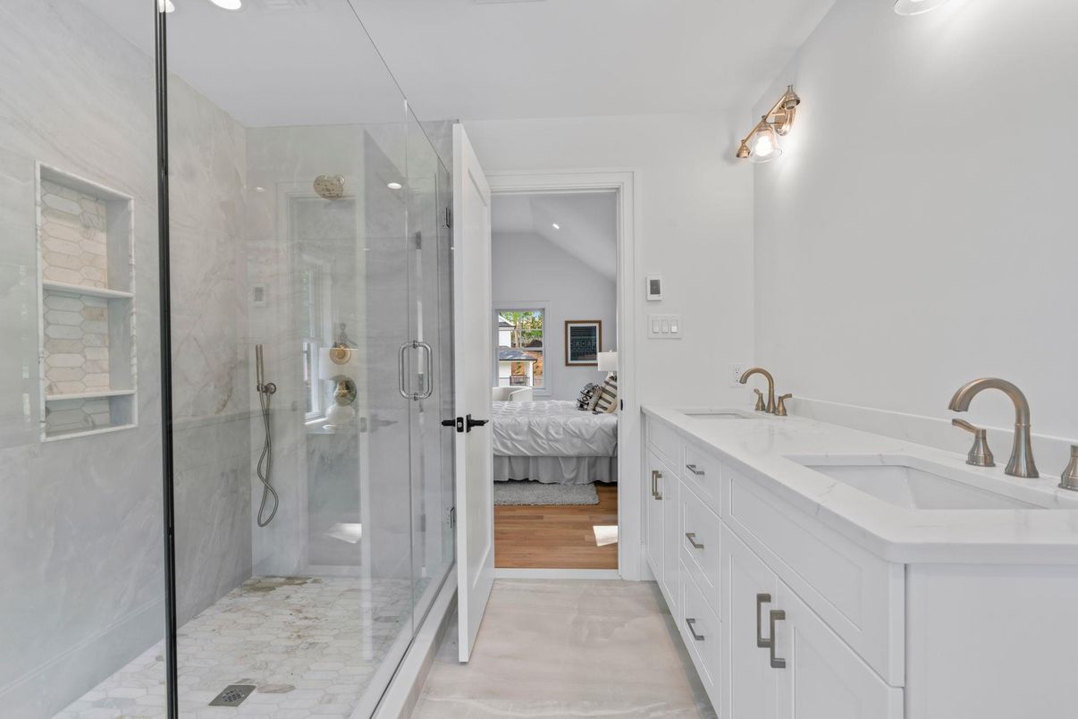 Bathroom, Bedroom, Dual Sink Vanities, Glass Shower, Interior, Marble, Recessed Lighting, Wood Texture Flooring