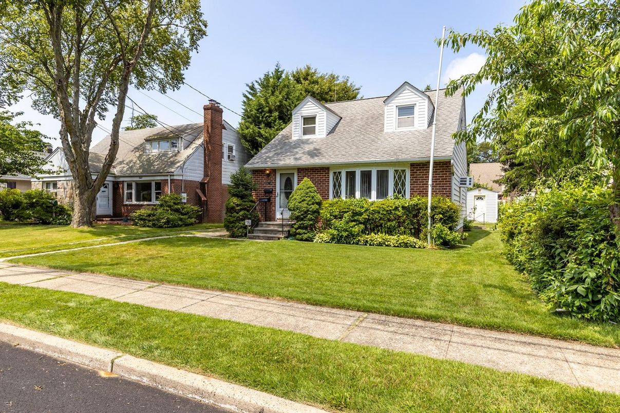 Exterior, Facade, Brick Facade, Cape Cod