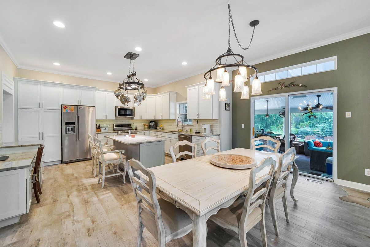 Dining room, Interior, Kitchen, Pendant Lights, Recessed Lighting, Stainless Steel Appliances, Wood Texture Flooring