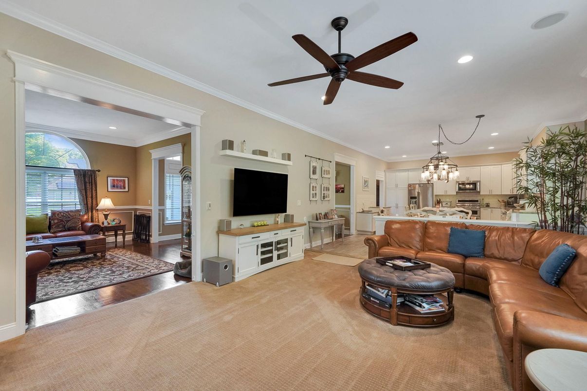 Chandelier, Interior, Kitchen, Living room, Pendant Lights, Recessed Lighting, Stainless Steel Appliances, Wood Texture Flooring