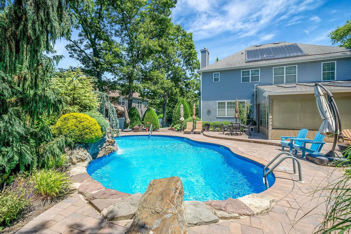 Exterior, Pool, Solar Panels