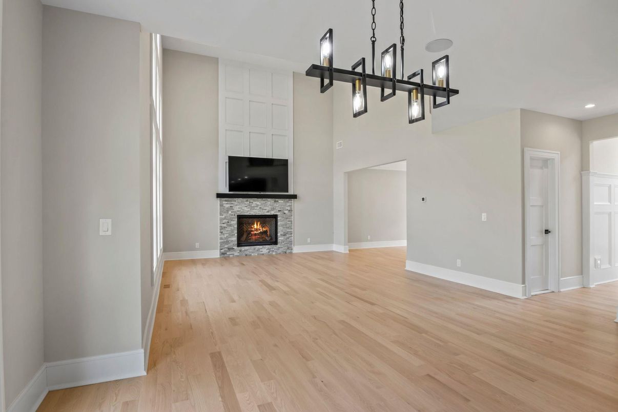 Empty room, Fireplace, Interior, Pendant Lights, Recessed Lighting, Wood Texture Flooring