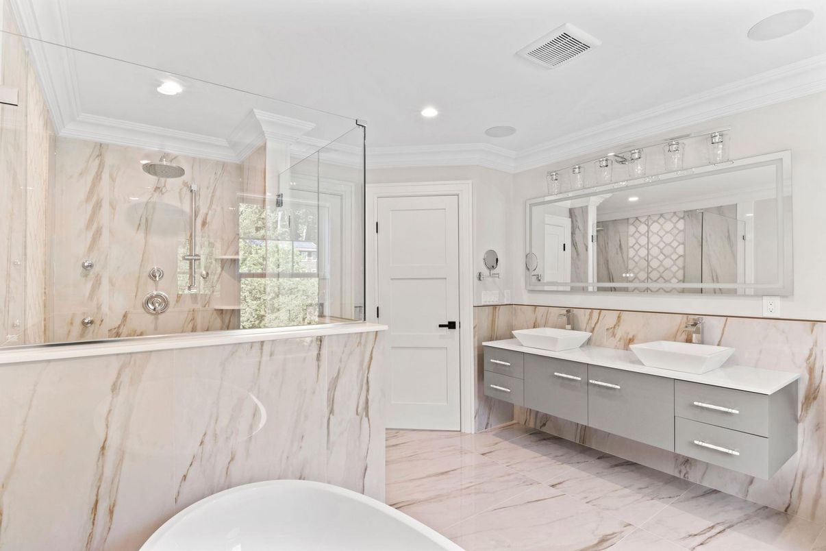 Bathroom, Dual Sink Vanities, Glass Shower, Interior, Marble, Marble Walls, Recessed Lighting