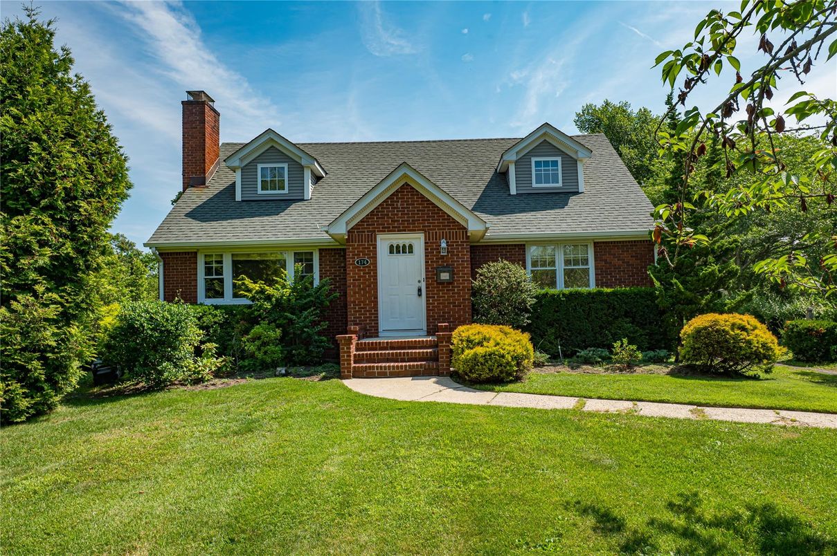 Exterior, Facade, Brick Facade, Cape Cod