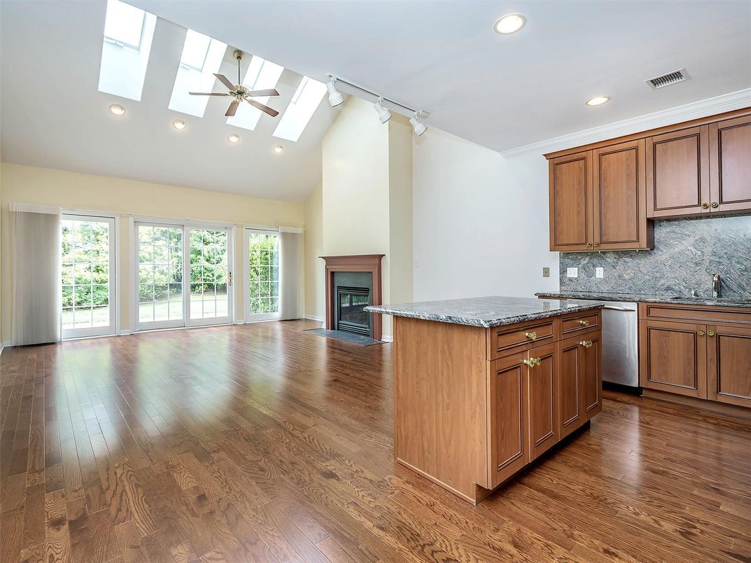 Empty room, Fireplace, Interior, Kitchen, Recessed Lighting, Wood Texture Flooring