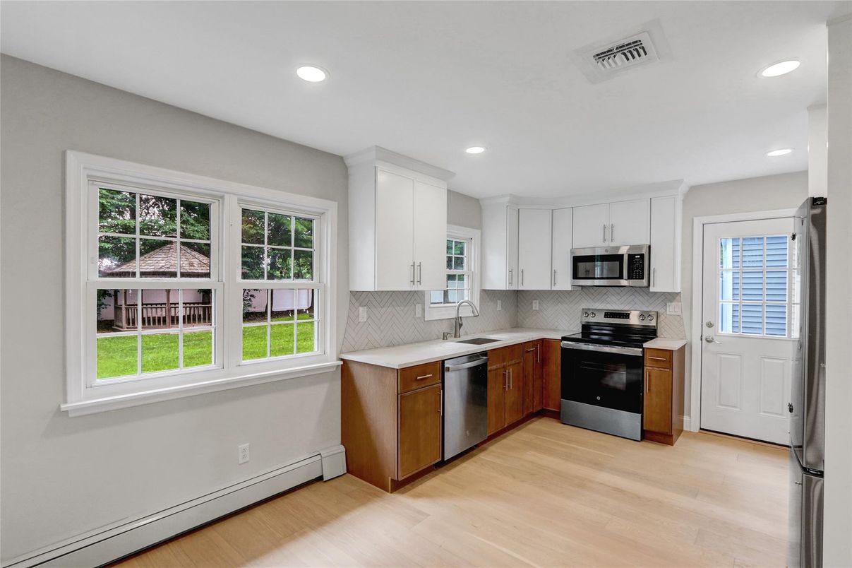 Interior, Kitchen, Recessed Lighting, Stainless Steel Appliances, Wood Texture Flooring