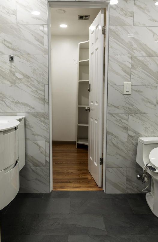 Bathroom, Interior, Marble Walls, Recessed Lighting, Wood Texture Flooring