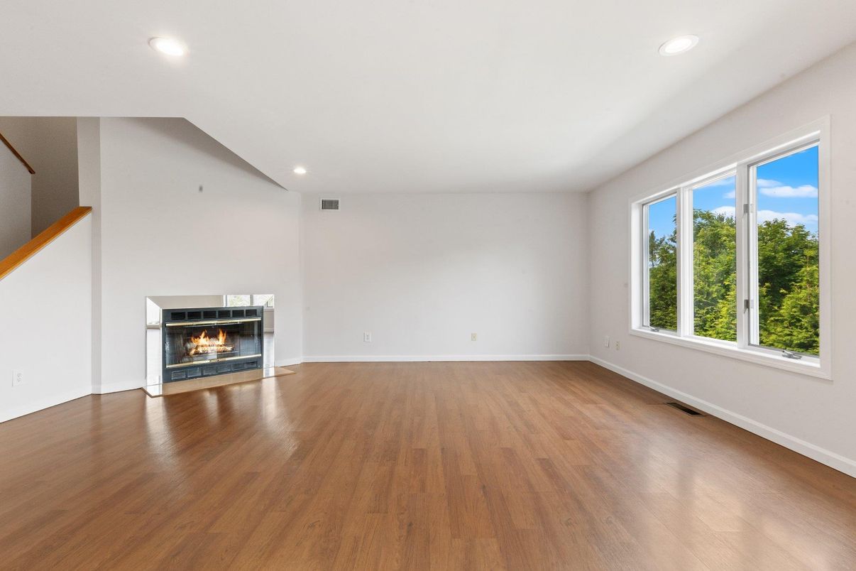 Empty room, Fireplace, Interior, Recessed Lighting, Wood Texture Flooring