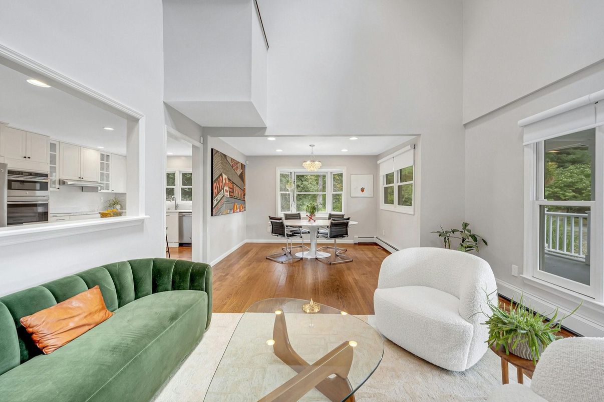 Chandelier, Dining room, Interior, Kitchen, Living room, Pendant Lights, Recessed Lighting, Stainless Steel Appliances, Wood Texture Flooring