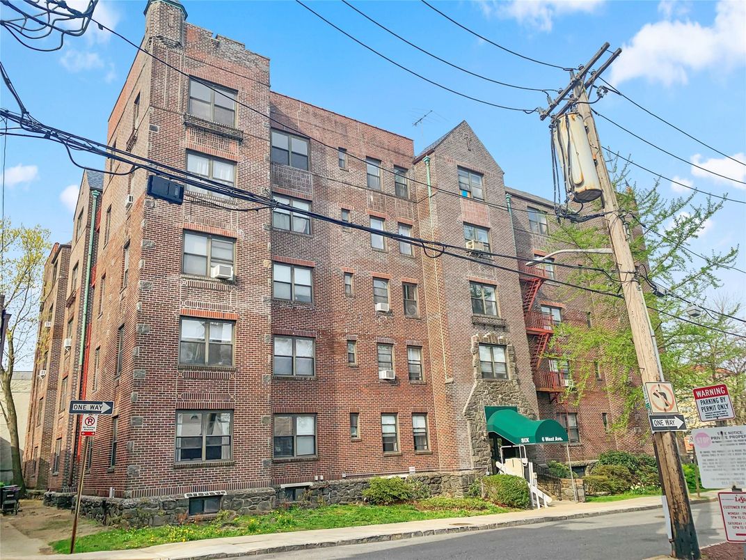 Exterior, Facade, Brick Facade, Condo Building