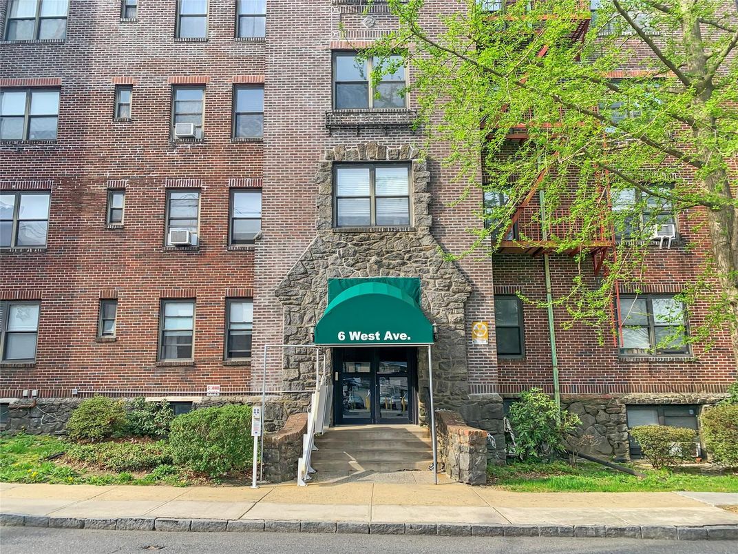 Exterior, Facade, Brick Facade, Condo Building