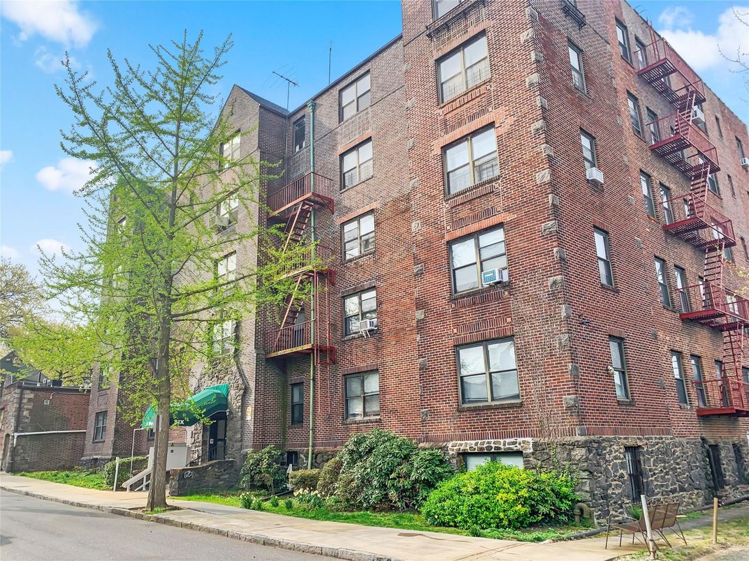 Exterior, Facade, Brick Facade, Condo Building
