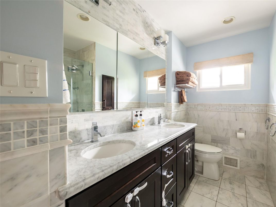 Bathroom, Dual Sink Vanities, Glass Shower, Interior, Marble, Recessed Lighting