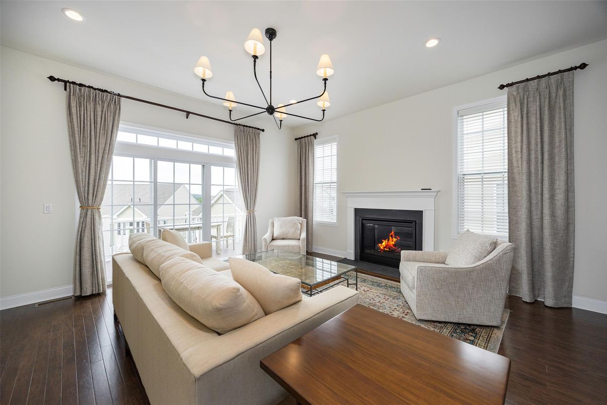 Chandelier, Fireplace, Interior, Living room, Pendant Lights, Recessed Lighting, Wood Texture Flooring