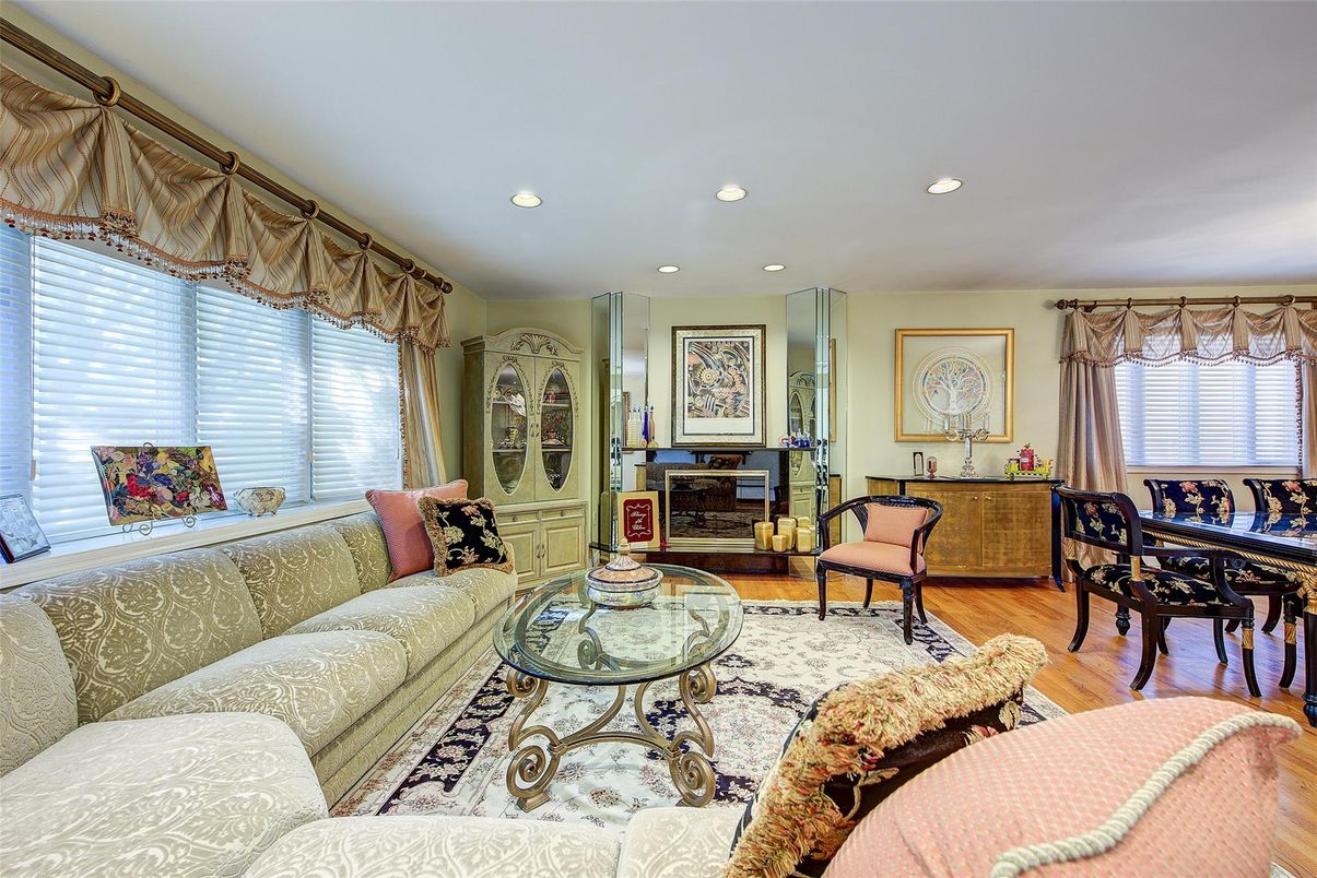 Dining room, Fireplace, Interior, Living room, Recessed Lighting, Wood Texture Flooring