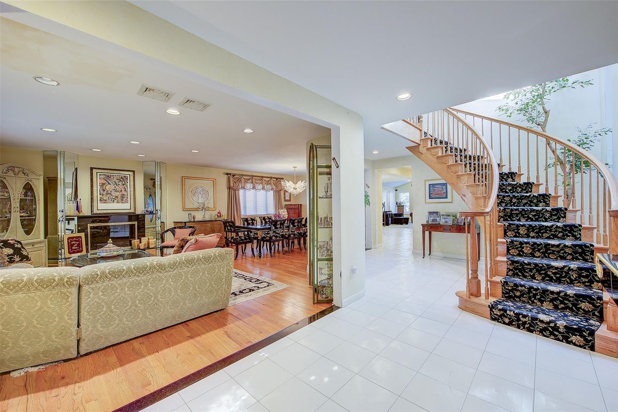 Chandelier, Dining room, Fireplace, Interior, Living room, Recessed Lighting, Wood Texture Flooring