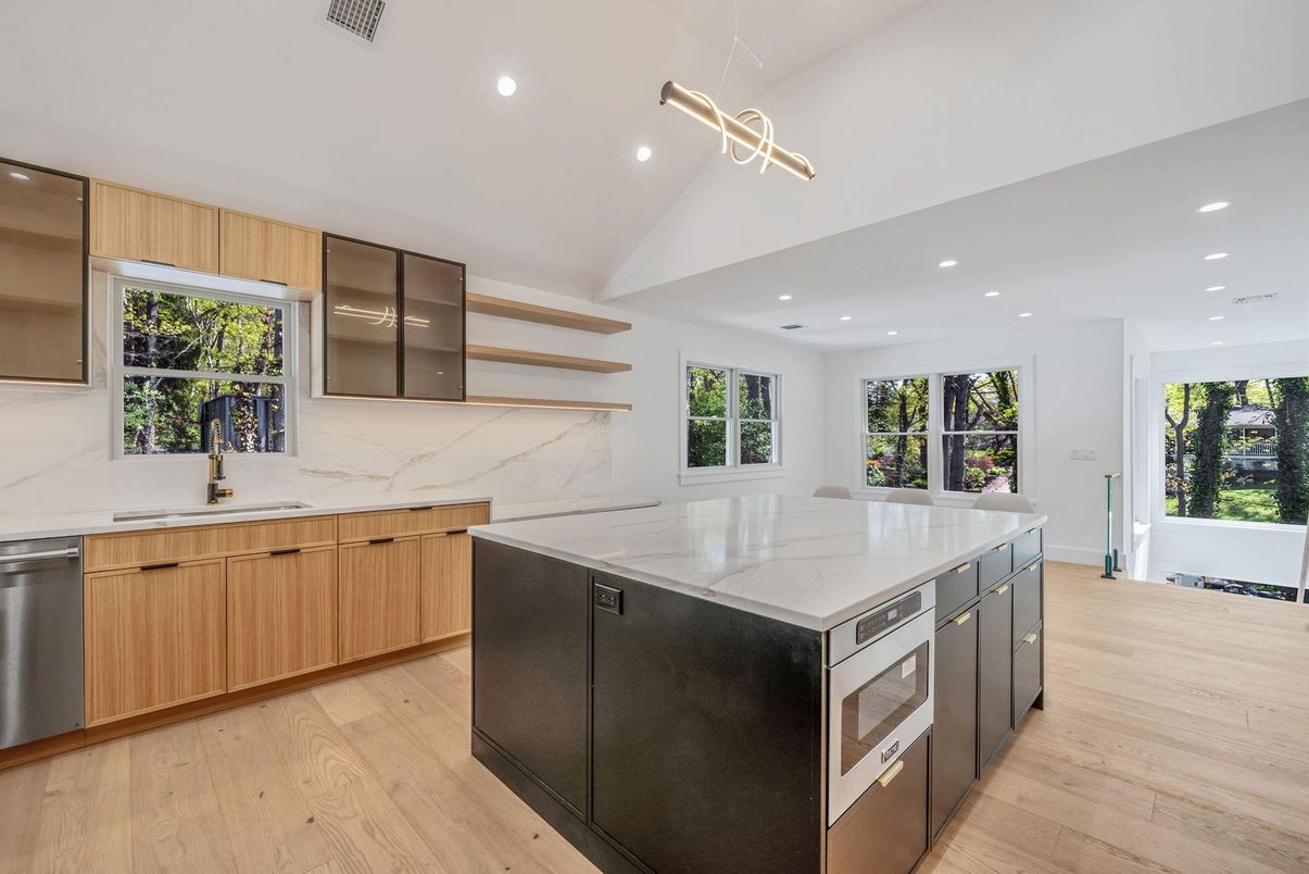 Interior, Kitchen, Marble Walls, Pendant Lights, Recessed Lighting, Stainless Steel Appliances, Wood Texture Flooring