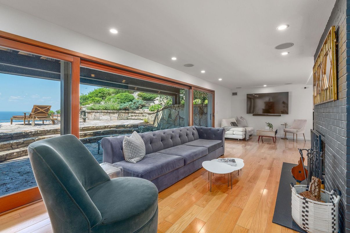 Fireplace, Interior, Living room, Recessed Lighting, Water, Wood Texture Flooring