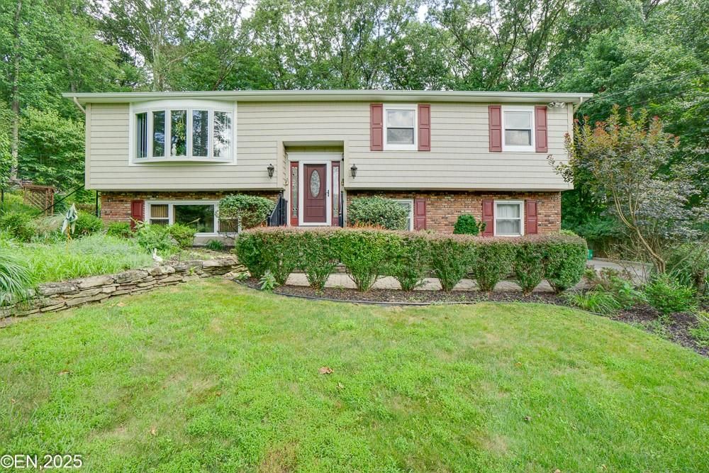 Exterior, Facade, Brick Facade, Raised Ranch