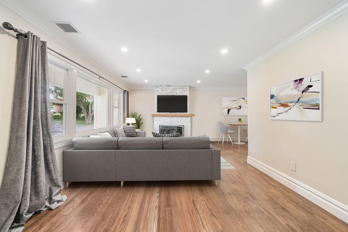 Dining room, Fireplace, Interior, Living room, Recessed Lighting, Wood Texture Flooring