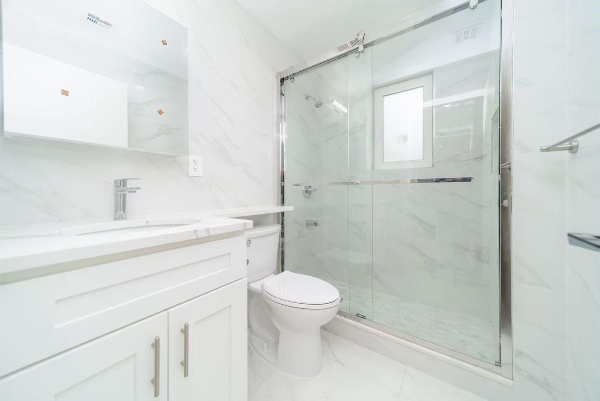 Bathroom, Glass Shower, Interior, Marble Walls, Tile Countertops