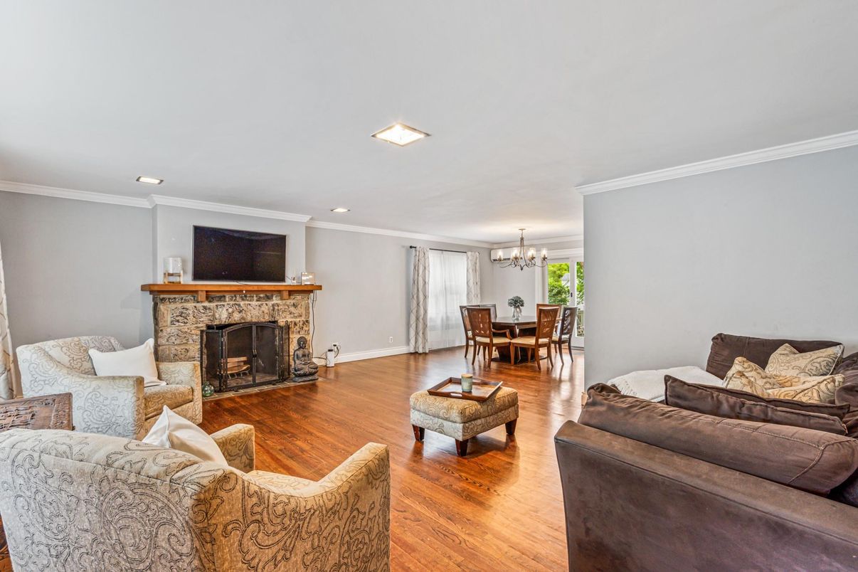 Chandelier, Dining room, Fireplace, Interior, Living room, Recessed Lighting, Wood Texture Flooring