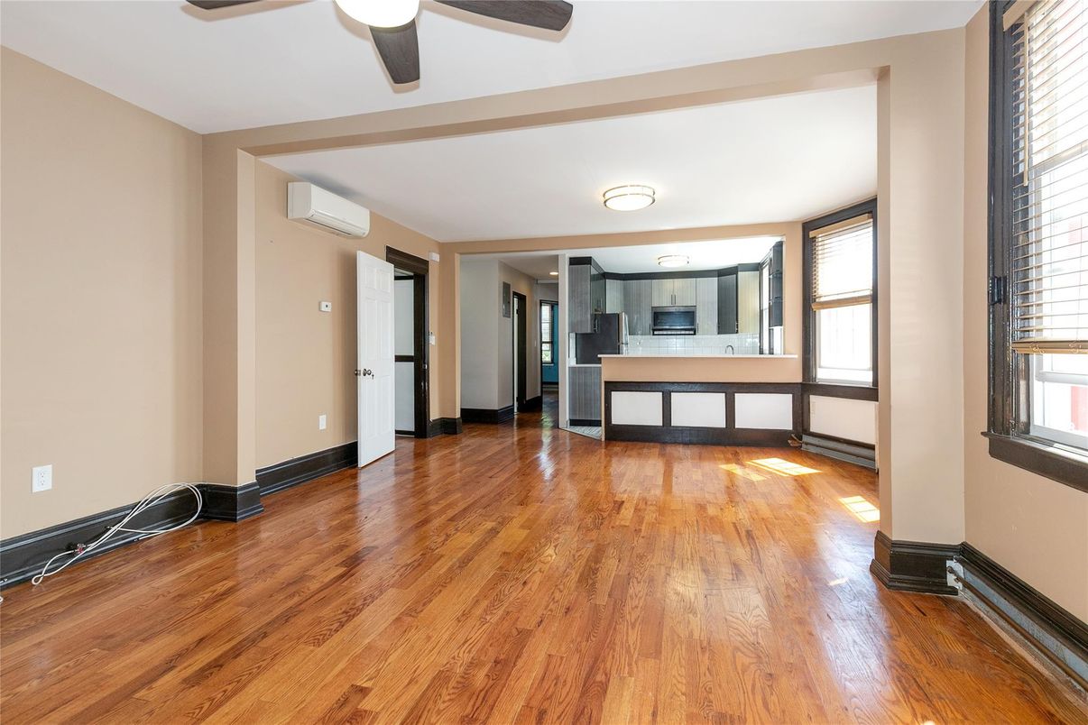 Empty room, Interior, Kitchen, Stainless Steel Appliances, Wood Texture Flooring