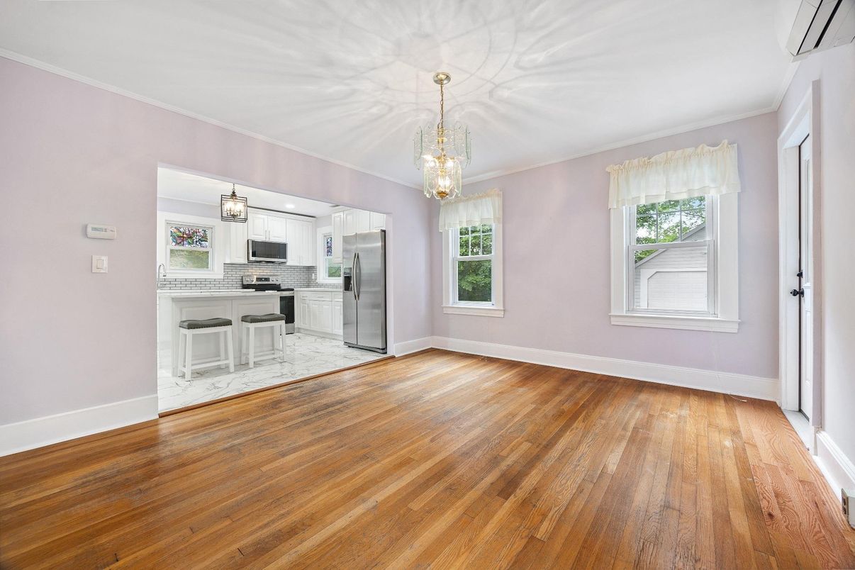 Chandelier, Empty room, Interior, Kitchen, Marble, Pendant Lights, Stainless Steel Appliances, Wood Texture Flooring