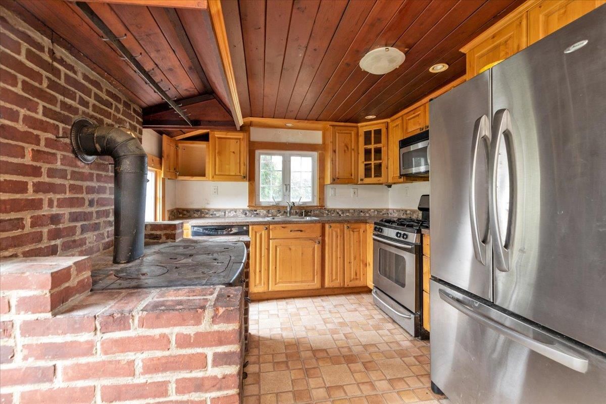 Interior, Kitchen, Recessed Lighting, Stainless Steel Appliances, Stone Walls, Wooden Ceilings