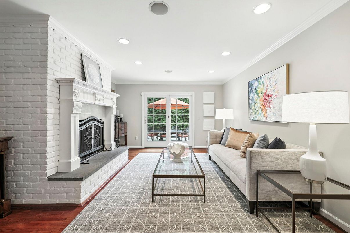 Fireplace, Interior, Living room, Recessed Lighting, Stone Walls, Wood Texture Flooring