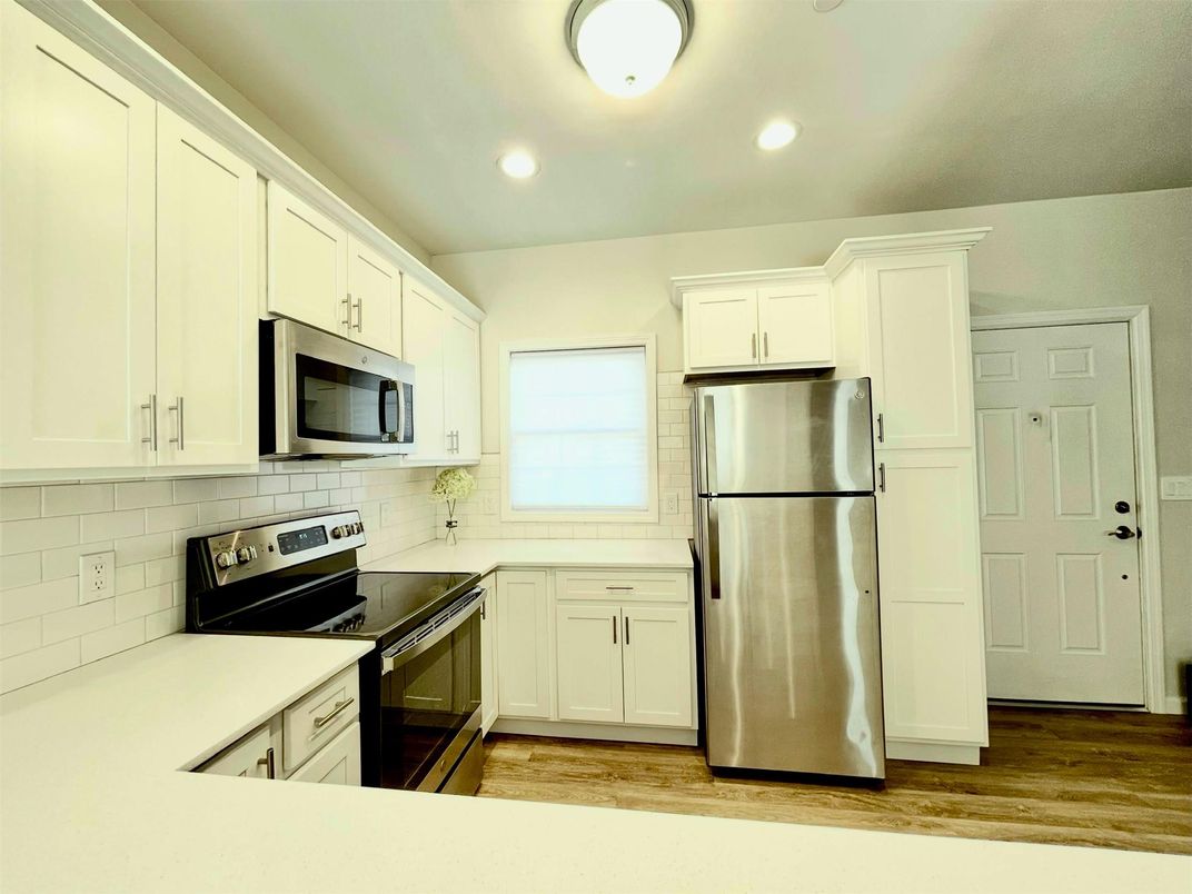 Interior, Kitchen, Recessed Lighting, Stainless Steel Appliances, Wood Texture Flooring