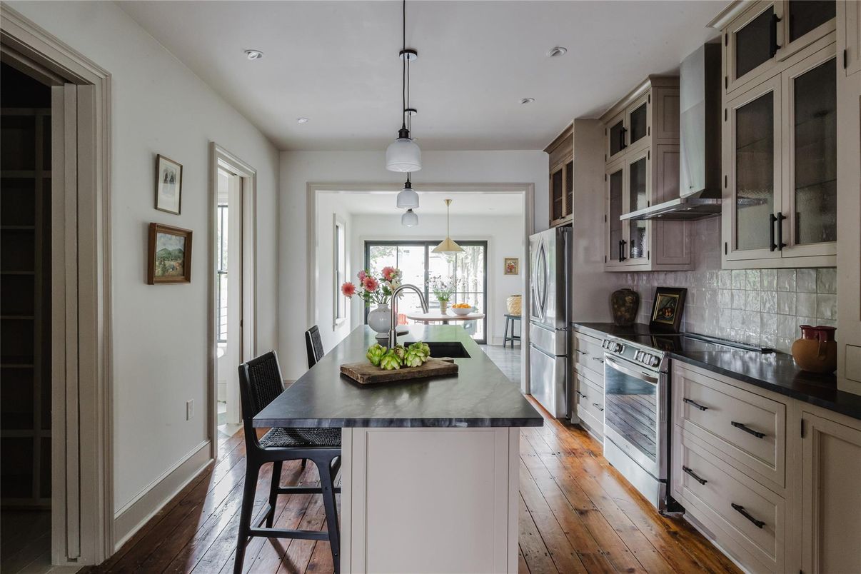 Dining room, Interior, Kitchen, Pendant Lights, Recessed Lighting, Stainless Steel Appliances, Wood Texture Flooring