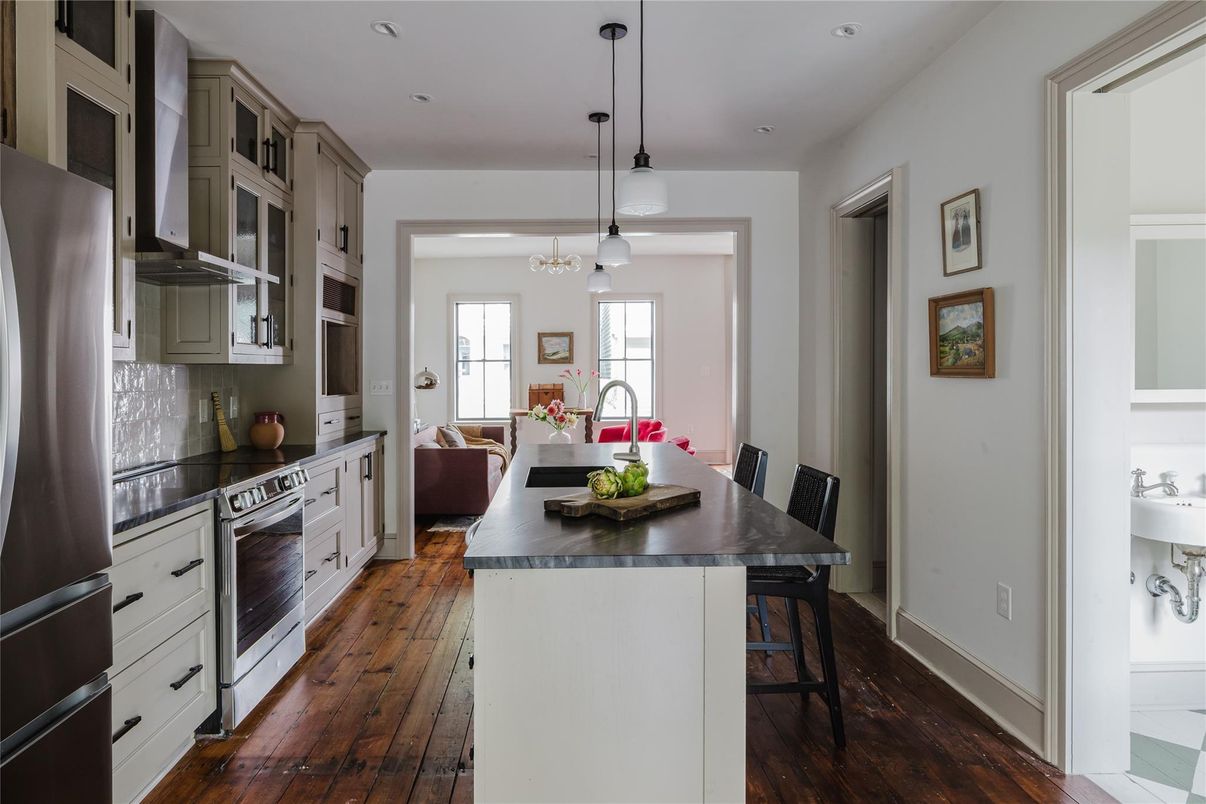Dining room, Interior, Kitchen, Pendant Lights, Recessed Lighting, Stainless Steel Appliances, Wood Texture Flooring