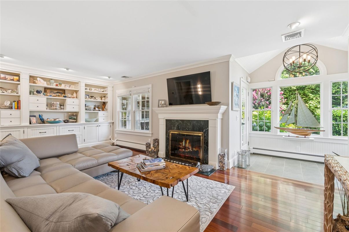 Chandelier, Fireplace, Interior, Living room, Recessed Lighting, Wood Texture Flooring