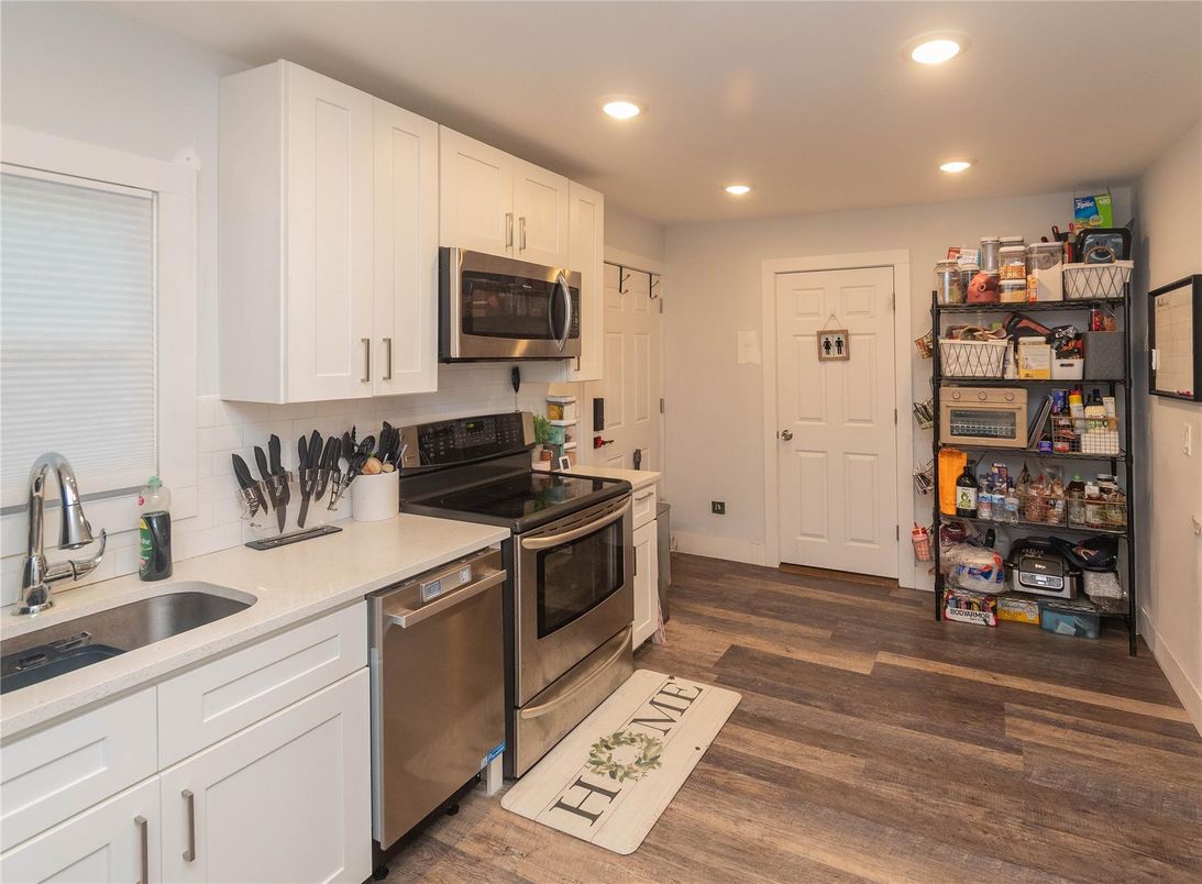 Interior, Kitchen, Recessed Lighting, Stainless Steel Appliances, Wood Texture Flooring
