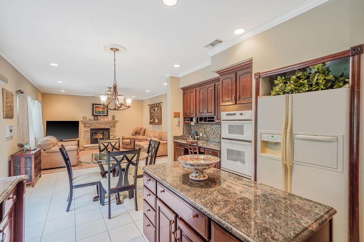 Chandelier, Dining room, Fireplace, Interior, Kitchen, Living room, Pendant Lights, Recessed Lighting