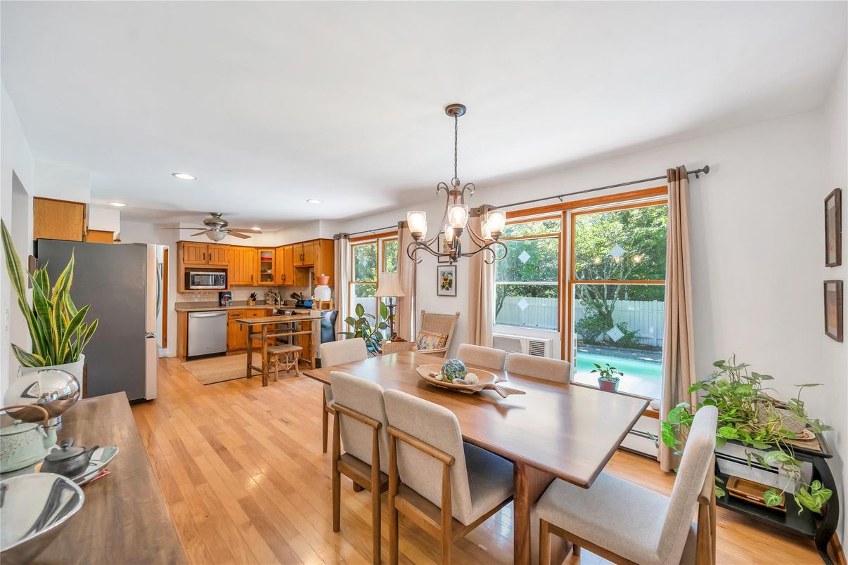 Chandelier, Dining room, Interior, Kitchen, Recessed Lighting, Stainless Steel Appliances, Wood Texture Flooring
