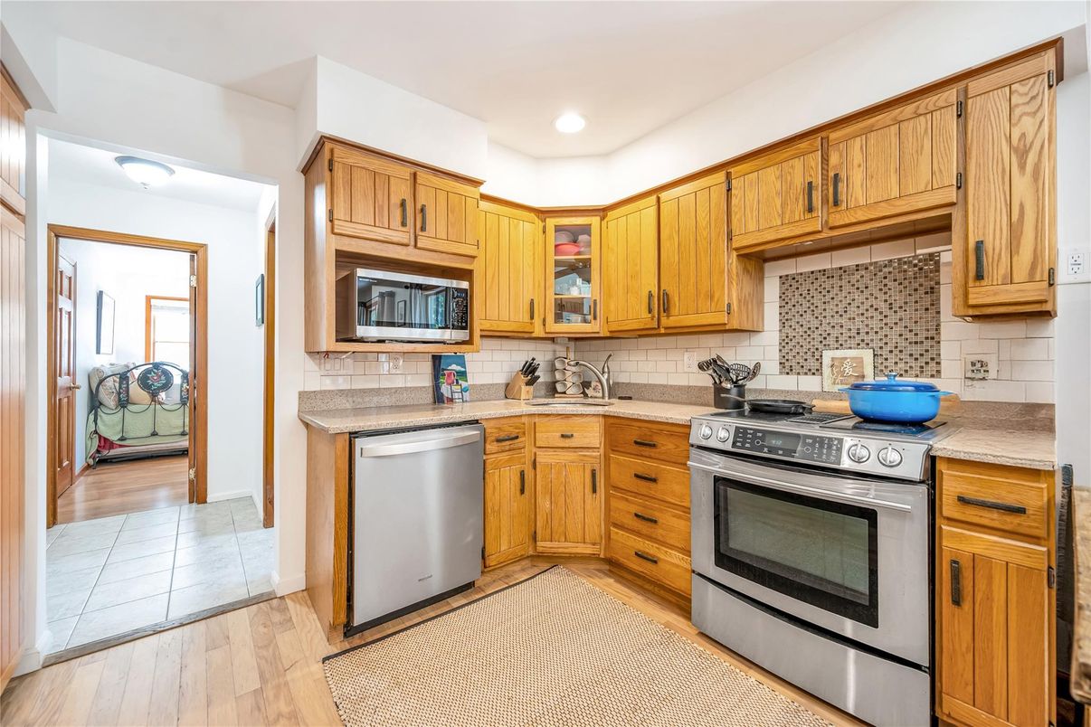 Interior, Kitchen, Recessed Lighting, Stainless Steel Appliances, Wood Texture Flooring