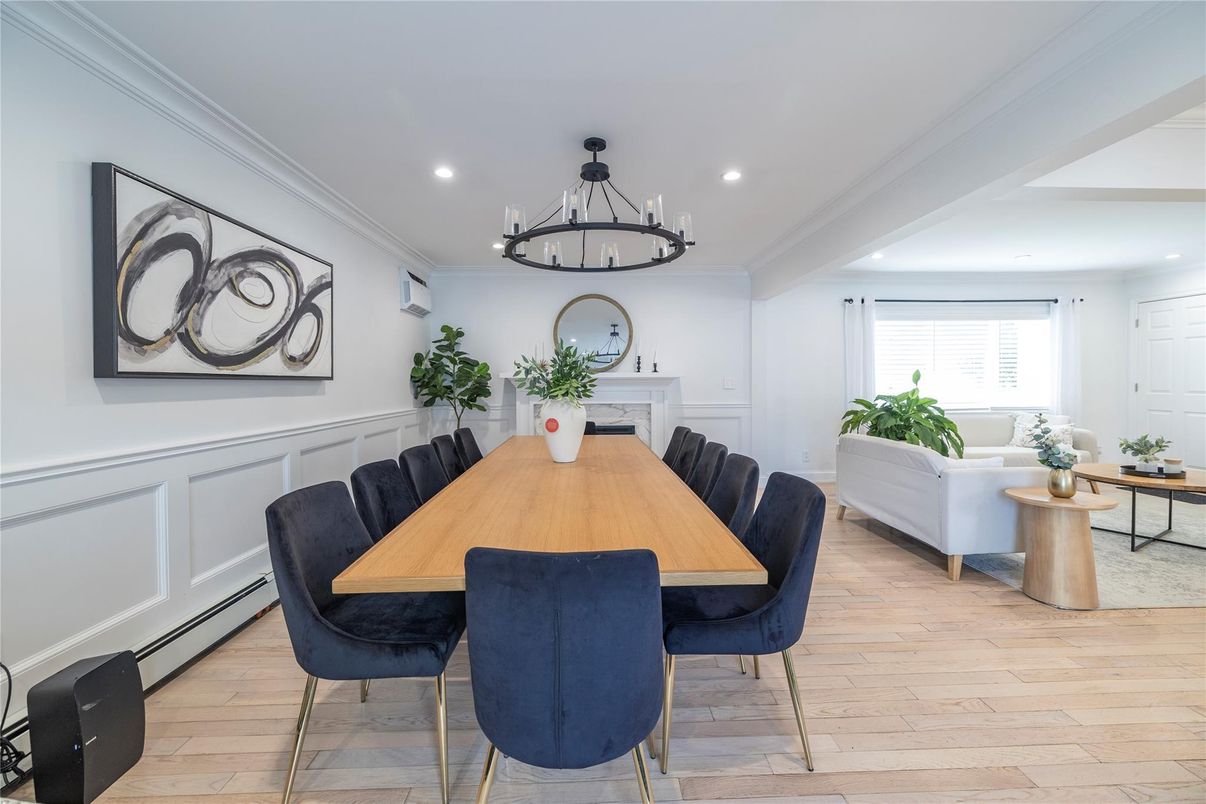 Chandelier, Dining room, Fireplace, Interior, Living room, Recessed Lighting, Wood Texture Flooring