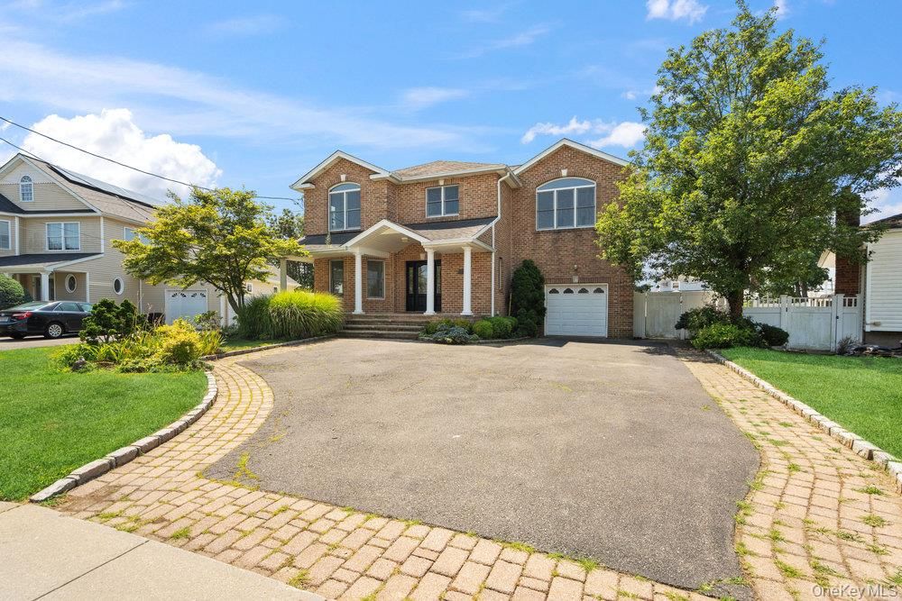 Attached, Exterior, Facade, Brick Facade, French Provincial