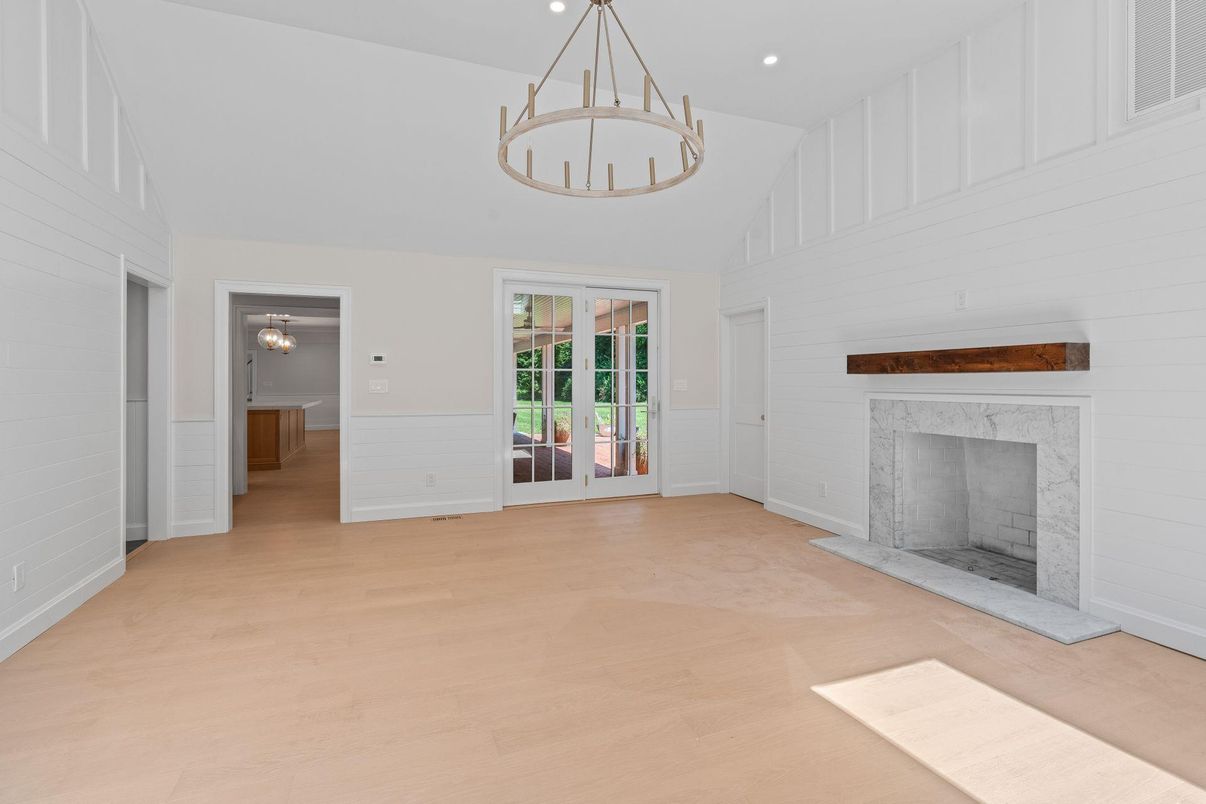 Empty room, Fireplace, Interior, Pendant Lights, Recessed Lighting, Wood Texture Flooring