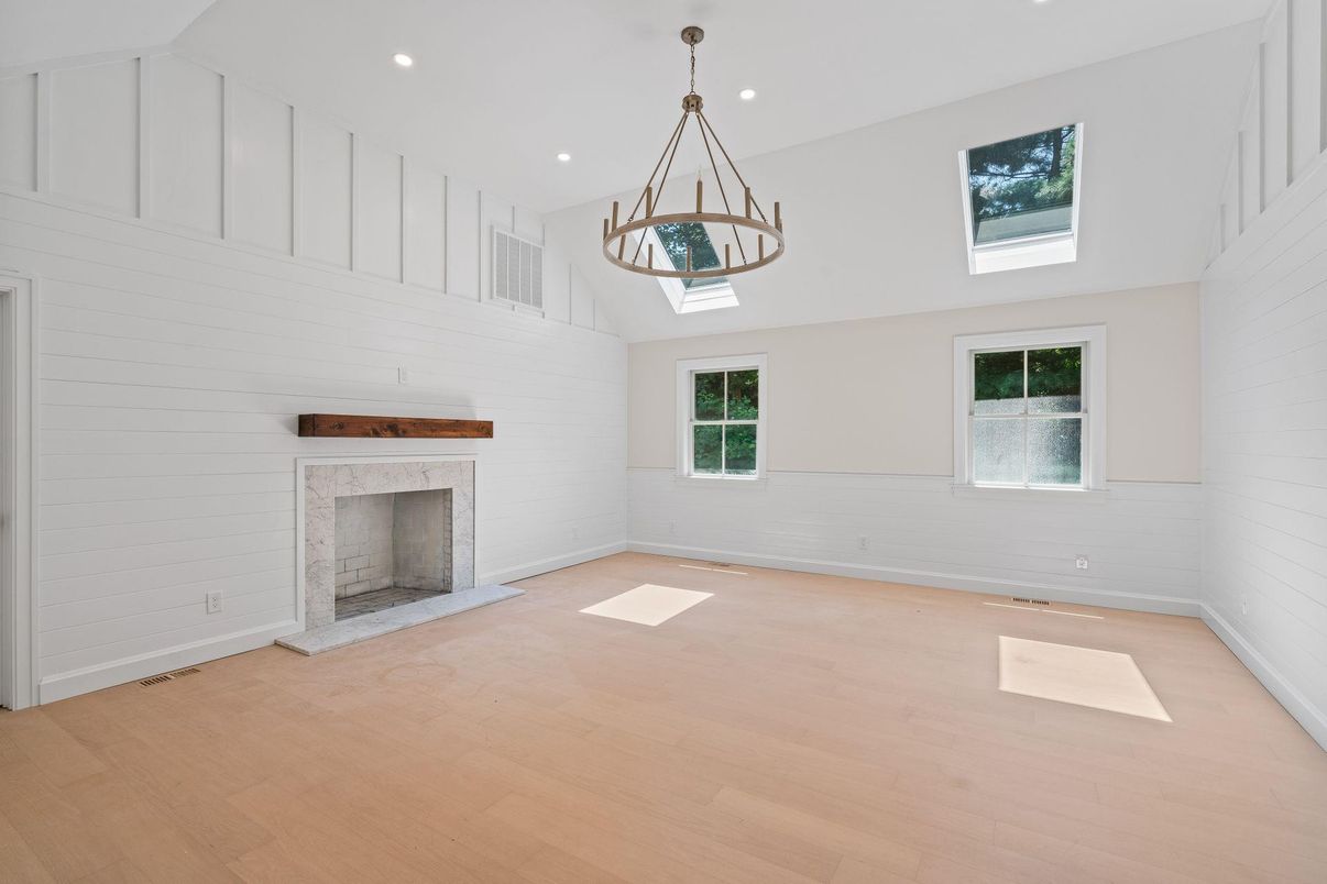Empty room, Fireplace, Interior, Pendant Lights, Recessed Lighting, Wood Texture Flooring