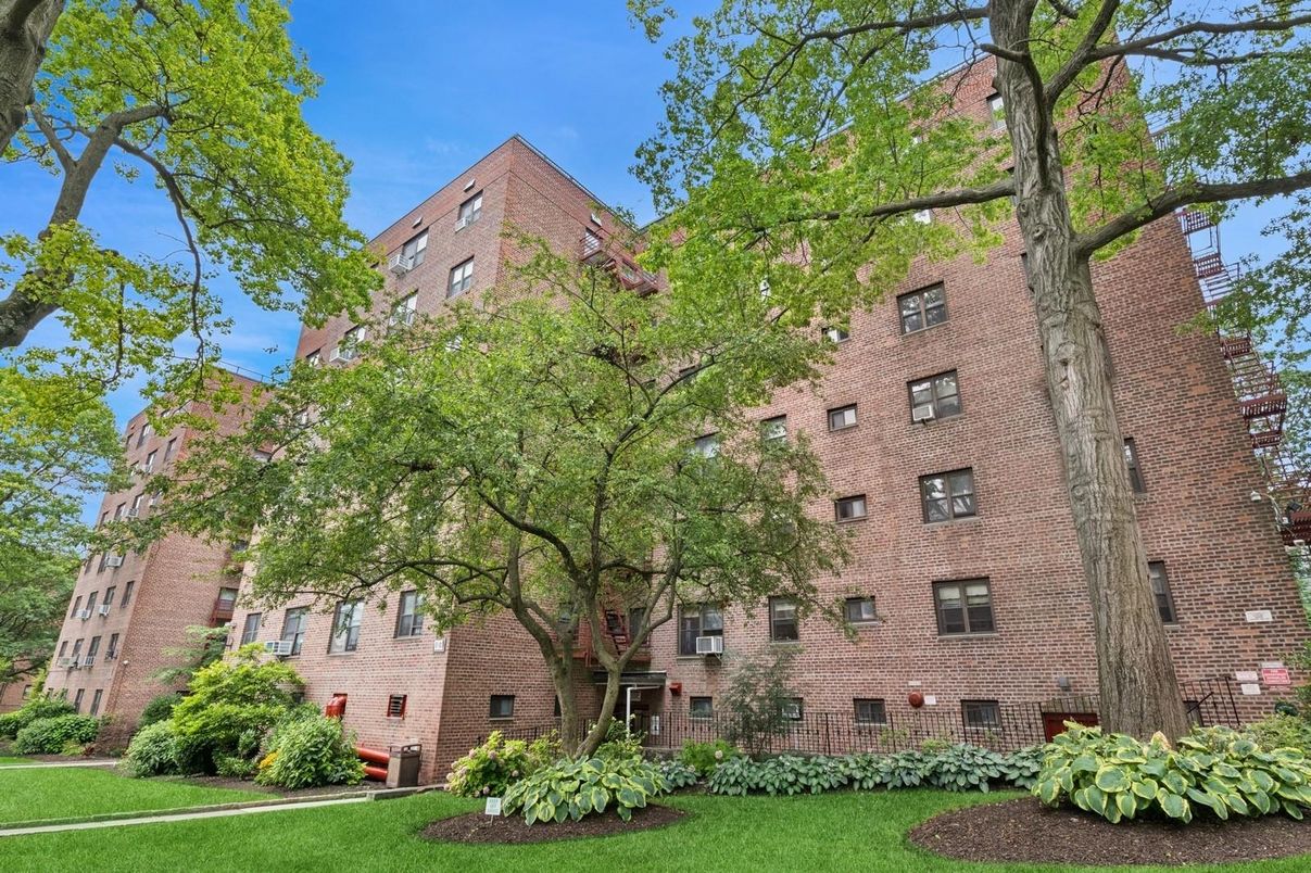 Exterior, Facade, Brick Facade, Condo Building