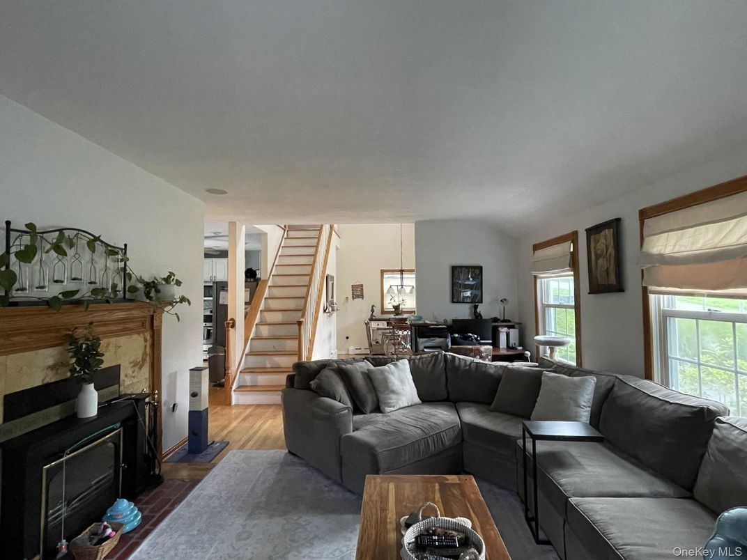 Dining room, Fireplace, Interior, Living room, Pendant Lights, Wood Texture Flooring