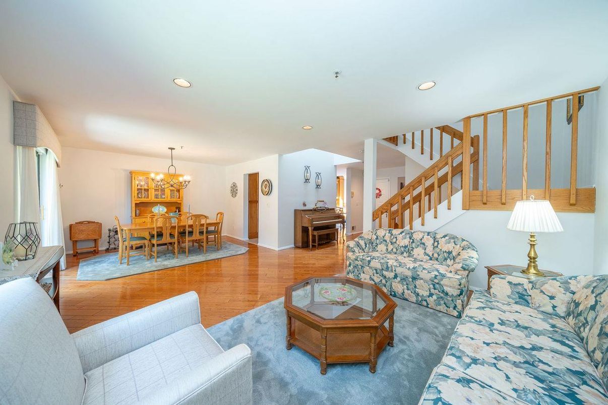 Chandelier, Dining room, Interior, Living room, Piano, Recessed Lighting, Wood Texture Flooring