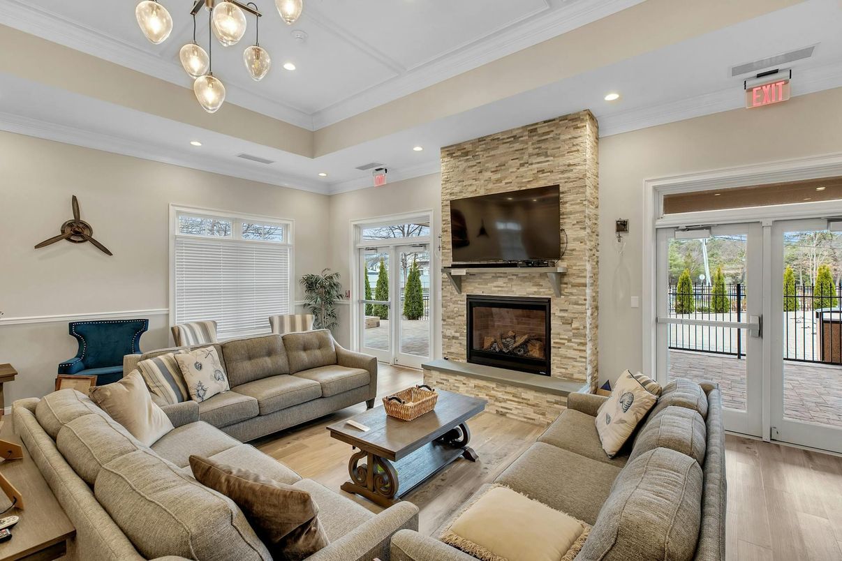Fireplace, Interior, Living room, Pendant Lights, Recessed Lighting, Stone Walls, Wood Texture Flooring