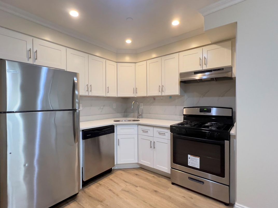 Interior, Kitchen, Recessed Lighting, Stainless Steel Appliances, Wood Texture Flooring