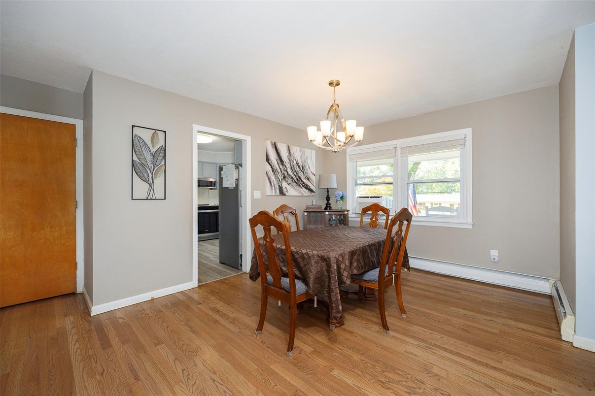 Chandelier, Dining room, Interior, Stainless Steel Appliances, Wood Texture Flooring