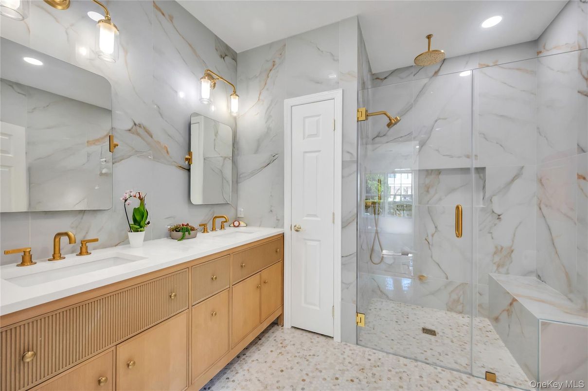 Bathroom, Dual Sink Vanities, Glass Shower, Interior, Marble Walls, Recessed Lighting