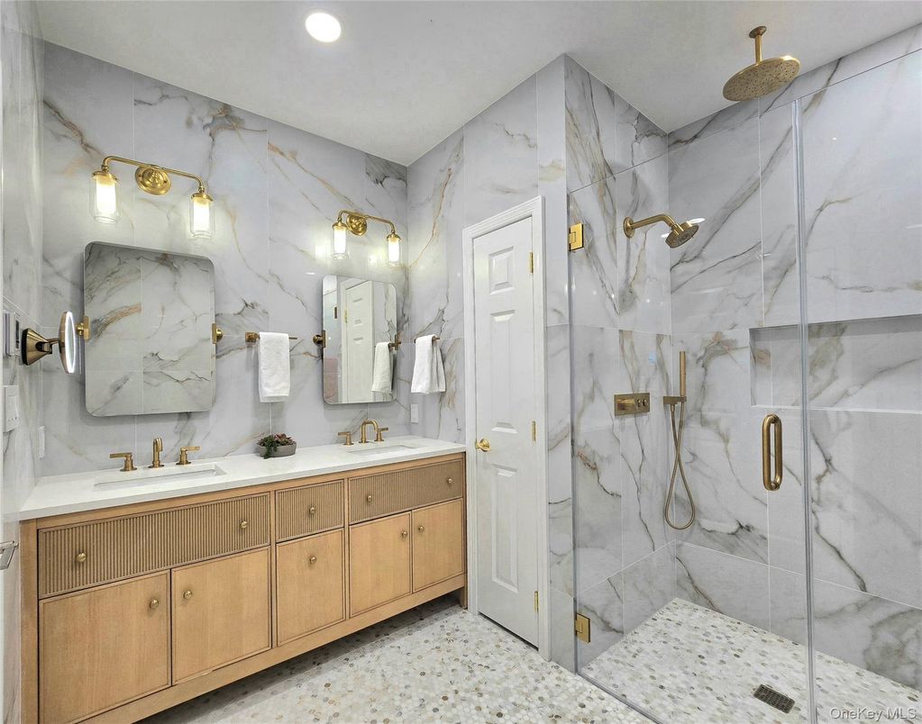 Bathroom, Dual Sink Vanities, Glass Shower, Interior, Marble Walls, Recessed Lighting